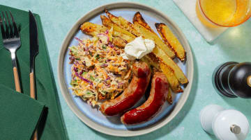 Gochujang and Honey Glazed Sausages with Sesame Chips and Coriander Slaw