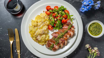 21 Day Aged Rump Steak and Pesto Sauce with Parmesan Smashed Potatoes, Pine Nuts and Rocket Salad