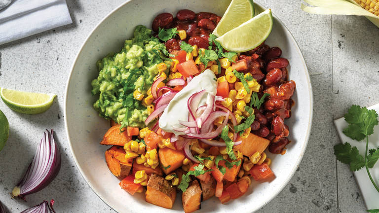 Mexican Beans & Roasted Sweet Potato Bowl with Guacamole, Pickled Onion and Sour Cream
