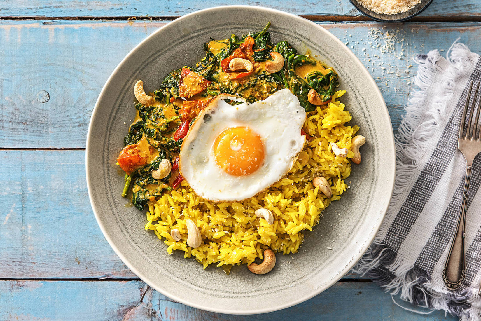 Riz jaune et curry d’épinards à la noix de coco