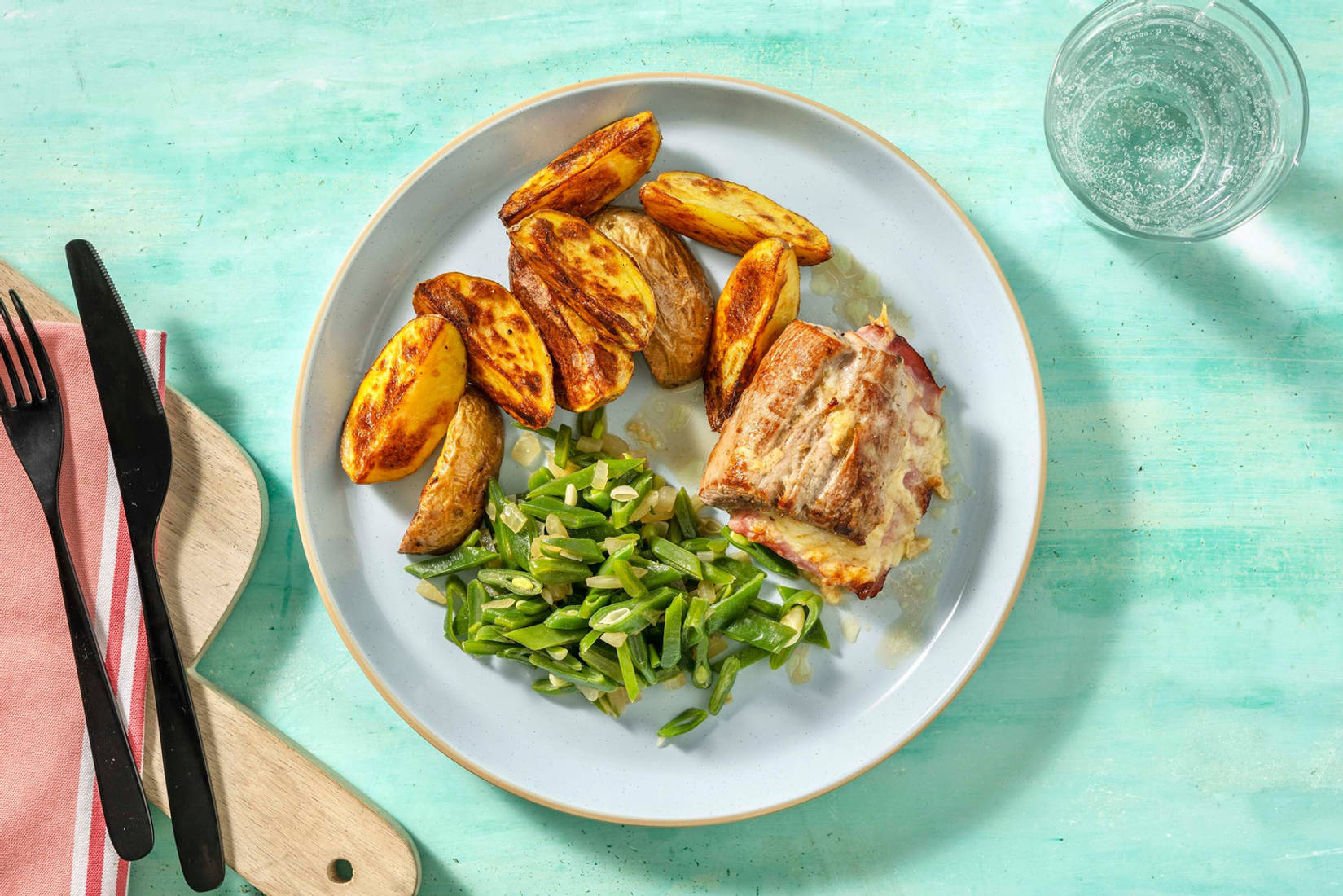 Gevulde varkenshaas met ham en oude kaas