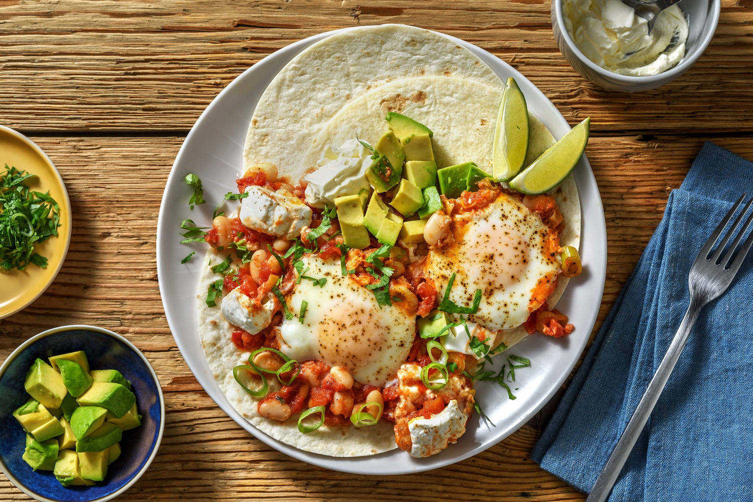 Huevos rancheros aux haricots blancs épicés