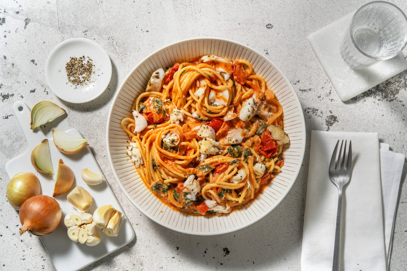 Penne met koolvis in mascarpone-kerstomatensaus