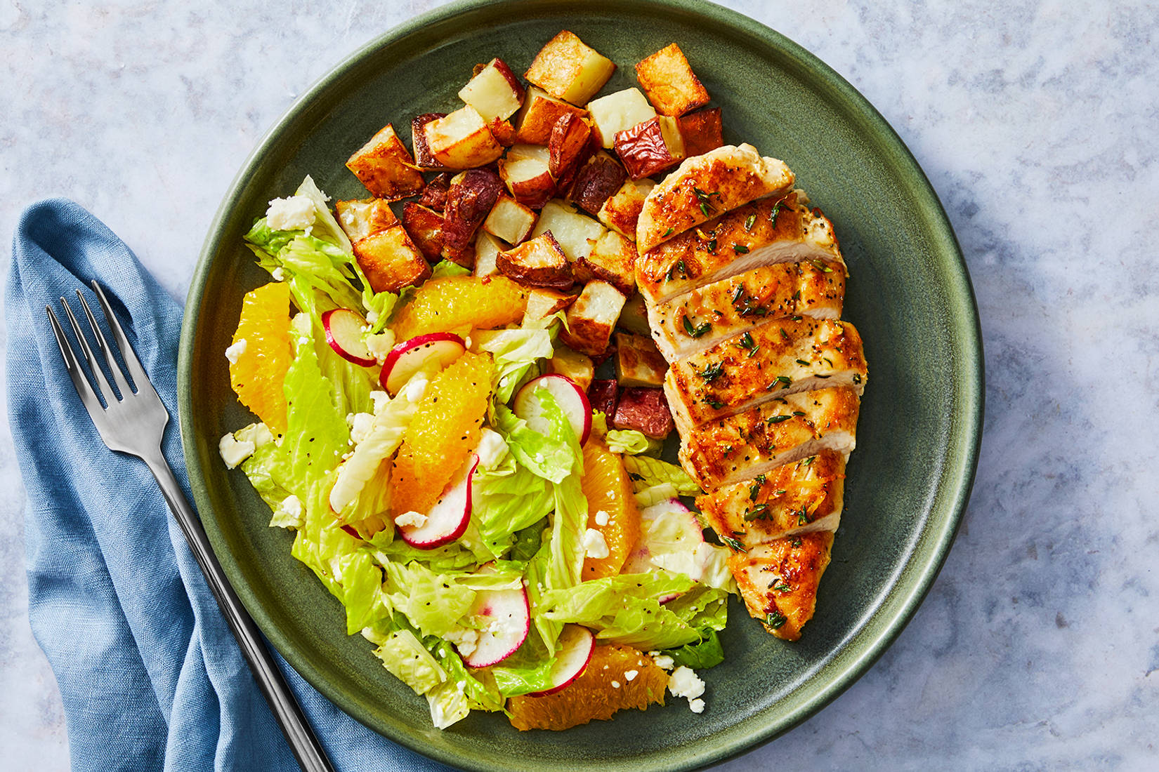 Poulet rôti à l’orange et au thym et pommes de terre