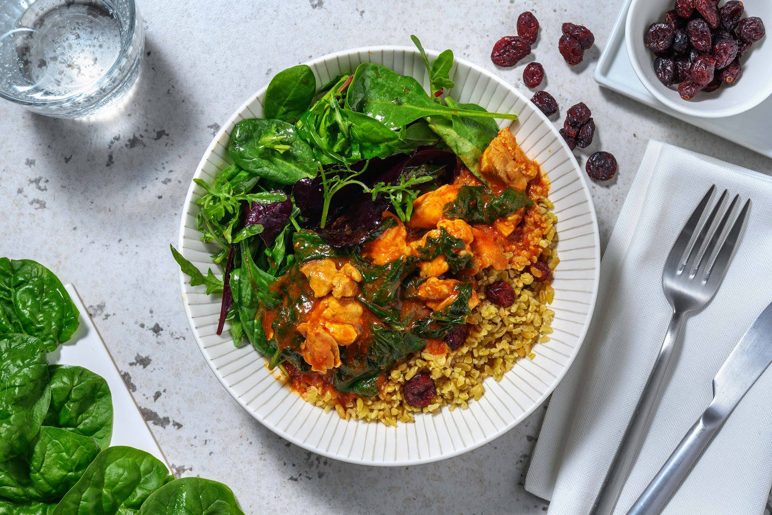 Harissa Chicken on Cranberry Bulgur