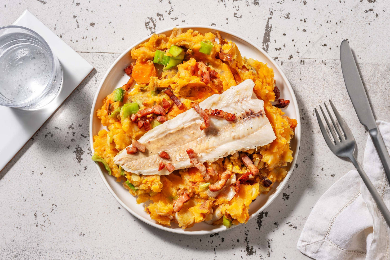 Koolvis met spekjes en zoete-aardappelpuree