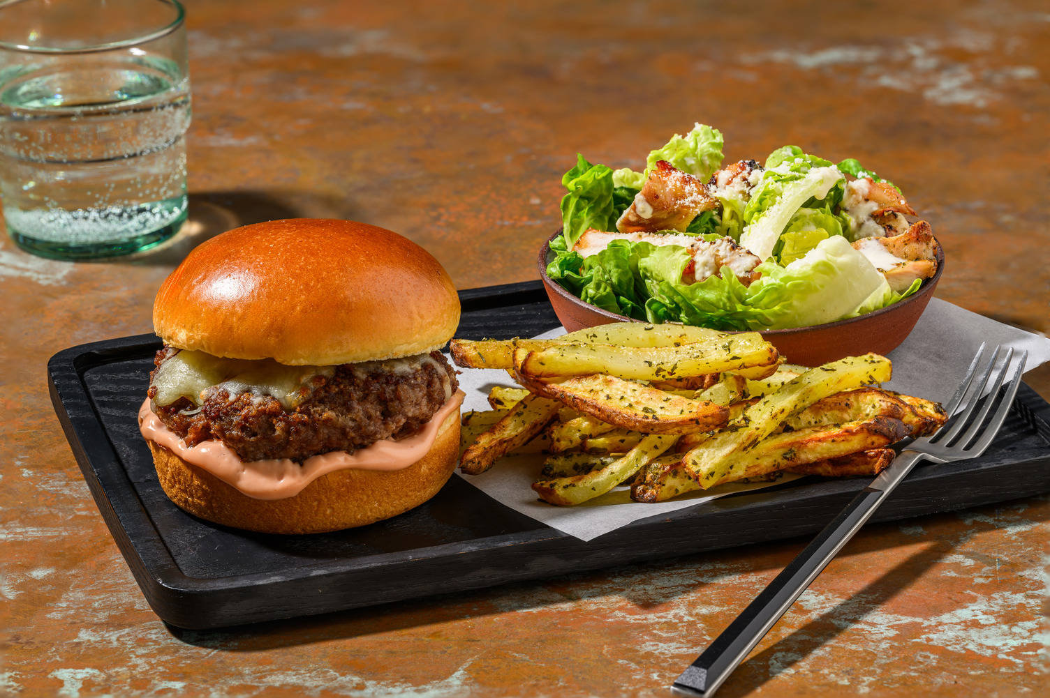 Classic Cheeseburger and Cheat's Chicken Caesar Salad