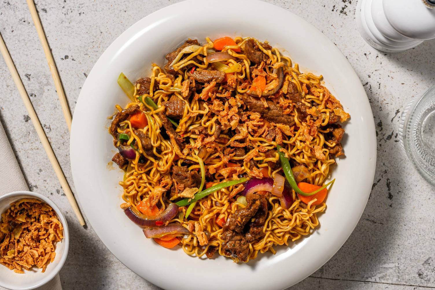 Stir-fry met biefstukreepjes en volkoren noedels