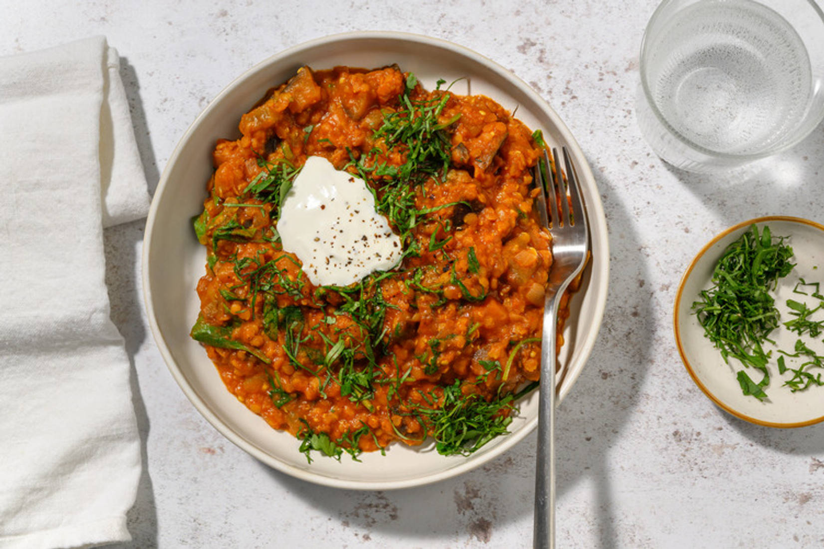 Dal de berenjena asada y espinacas