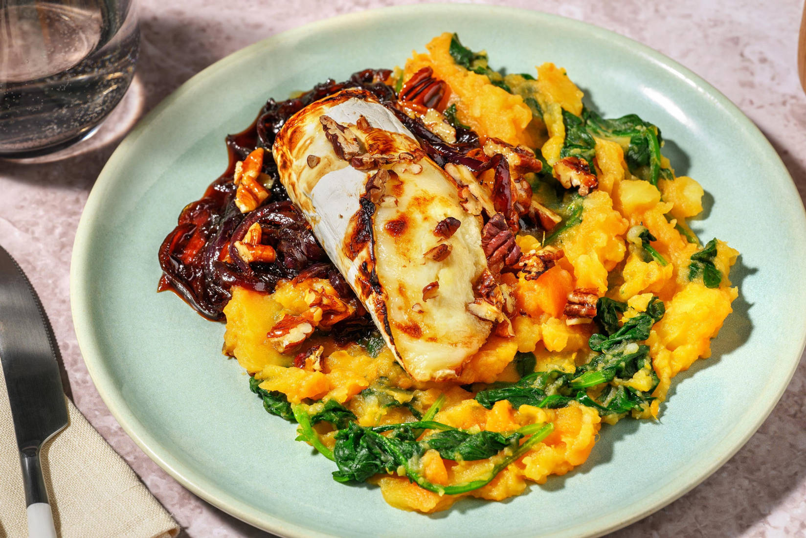 Stoemp au fromage de chèvre crémeux et jus à l'oignon