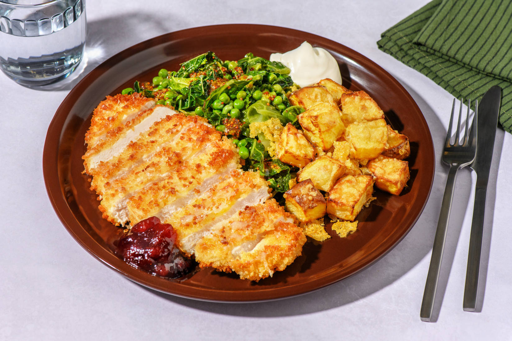 Alpine Inspired Chicken Schnitzel and Cheesy Roasties