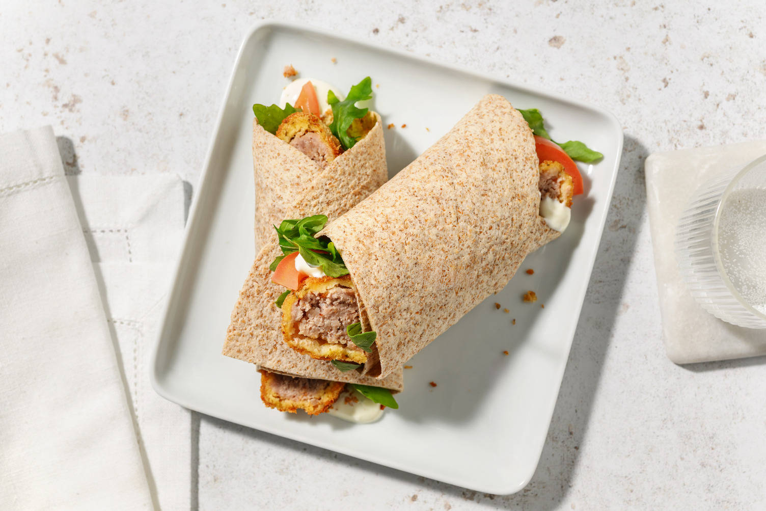 Wrap integrale al burger di tacchino impanato 