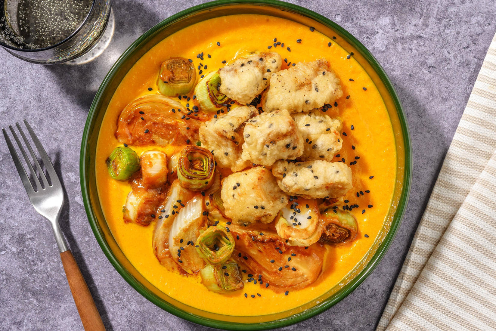 Merluzzo in pastella al sesamo nero 