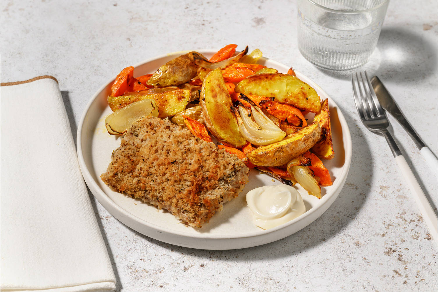 Merluza con costra de panko y queso italiano