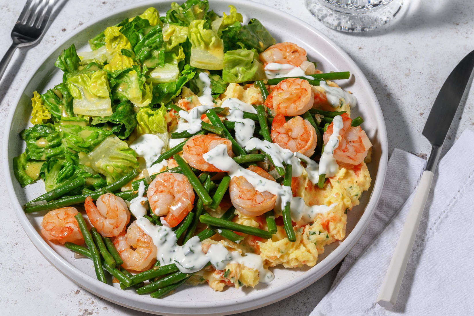 Garnelen auf Kräuter-Karottenstampf