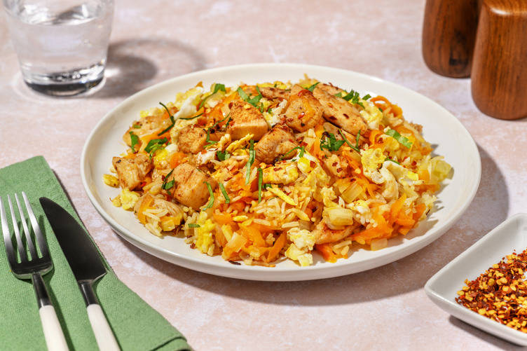 Arroz frito con extra de pollo estilo chaulafán