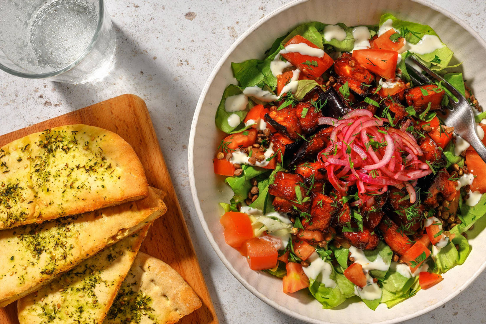 Aubergine laquée de harissa et pita au zaatar