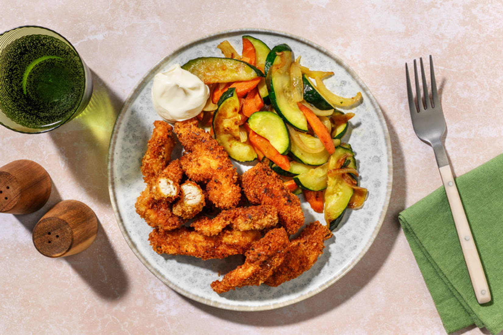 Crumbed Chicken Strips & Garlic Veggies