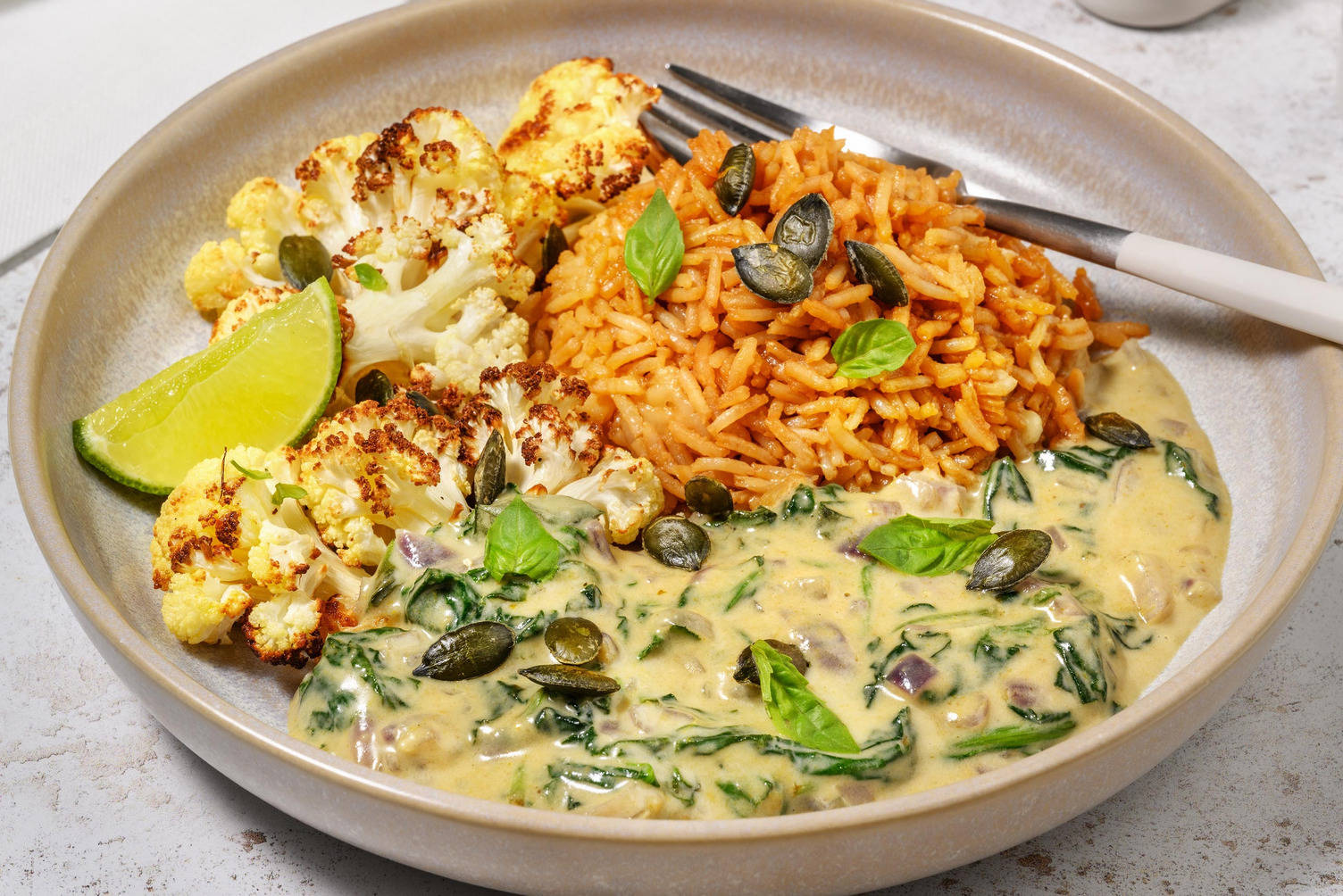 Geroosterde bloemkool in groene currysaus