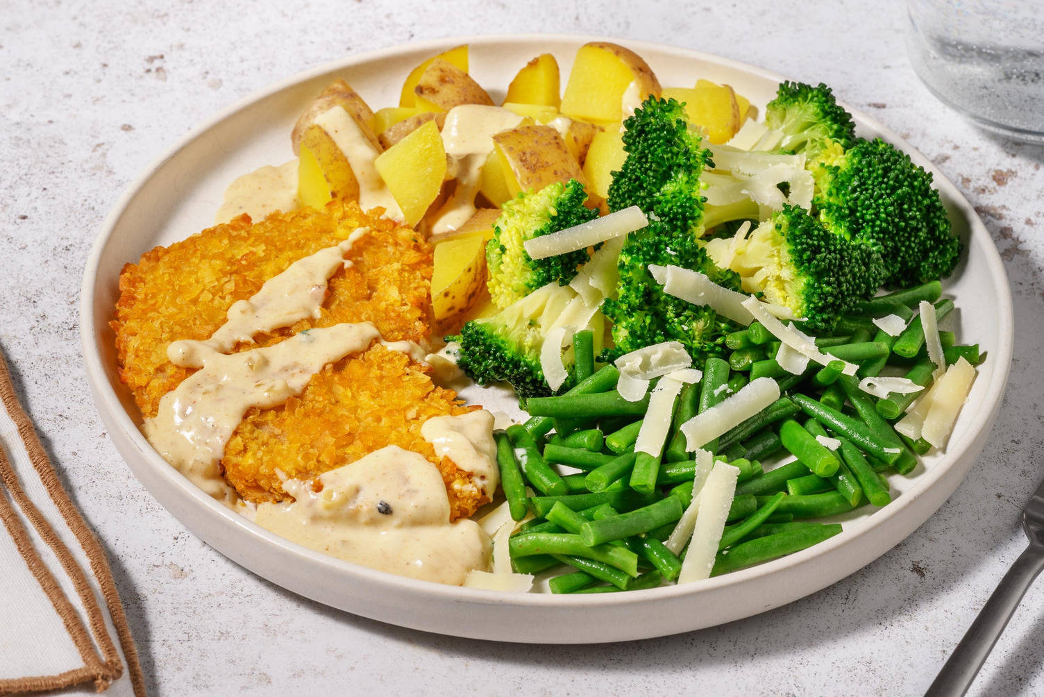 Escalope végé panée en sauce crémeuse au parmesan 