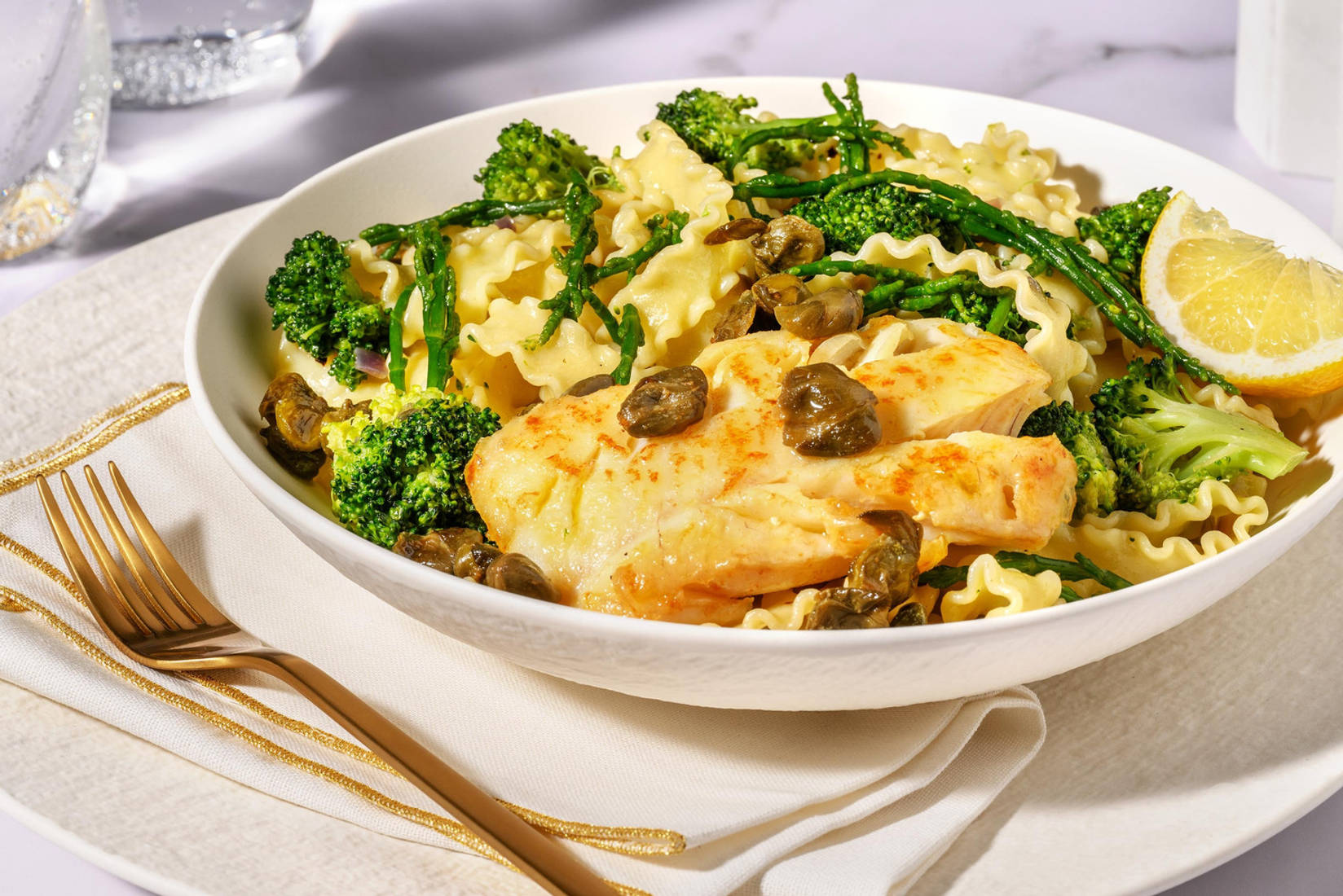 Mafaldine met kabeljauwfilet, zeekraal en kappertjes