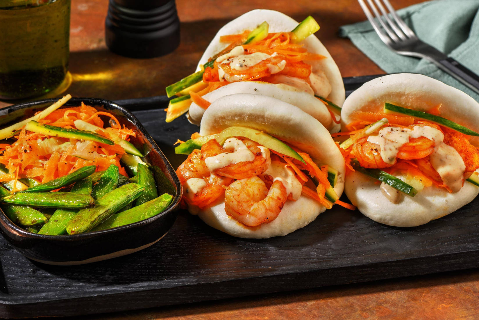 Bao buns met garnalen in 'swicy' saus