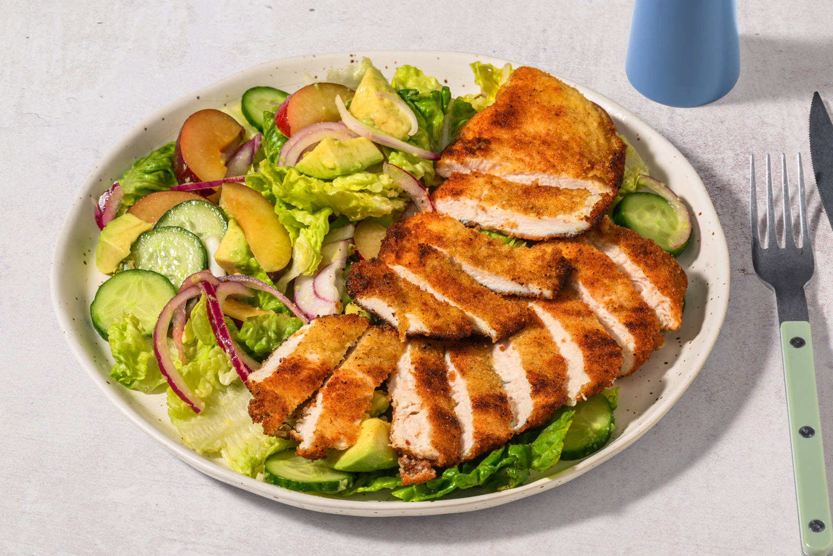 Crumbed Chicken & Herby Plum Salad