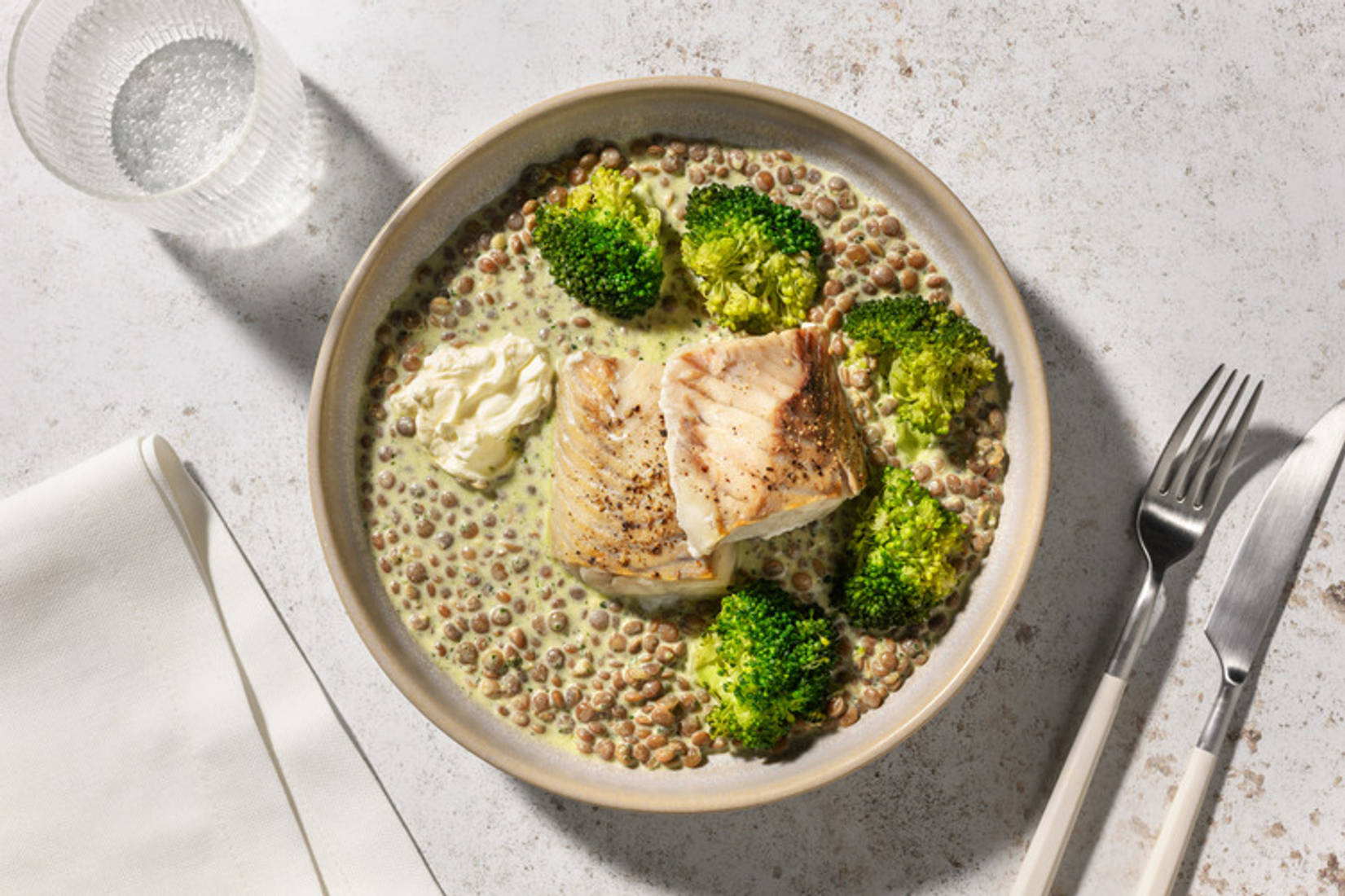 Seelachs auf sahnigem Linsengemüse