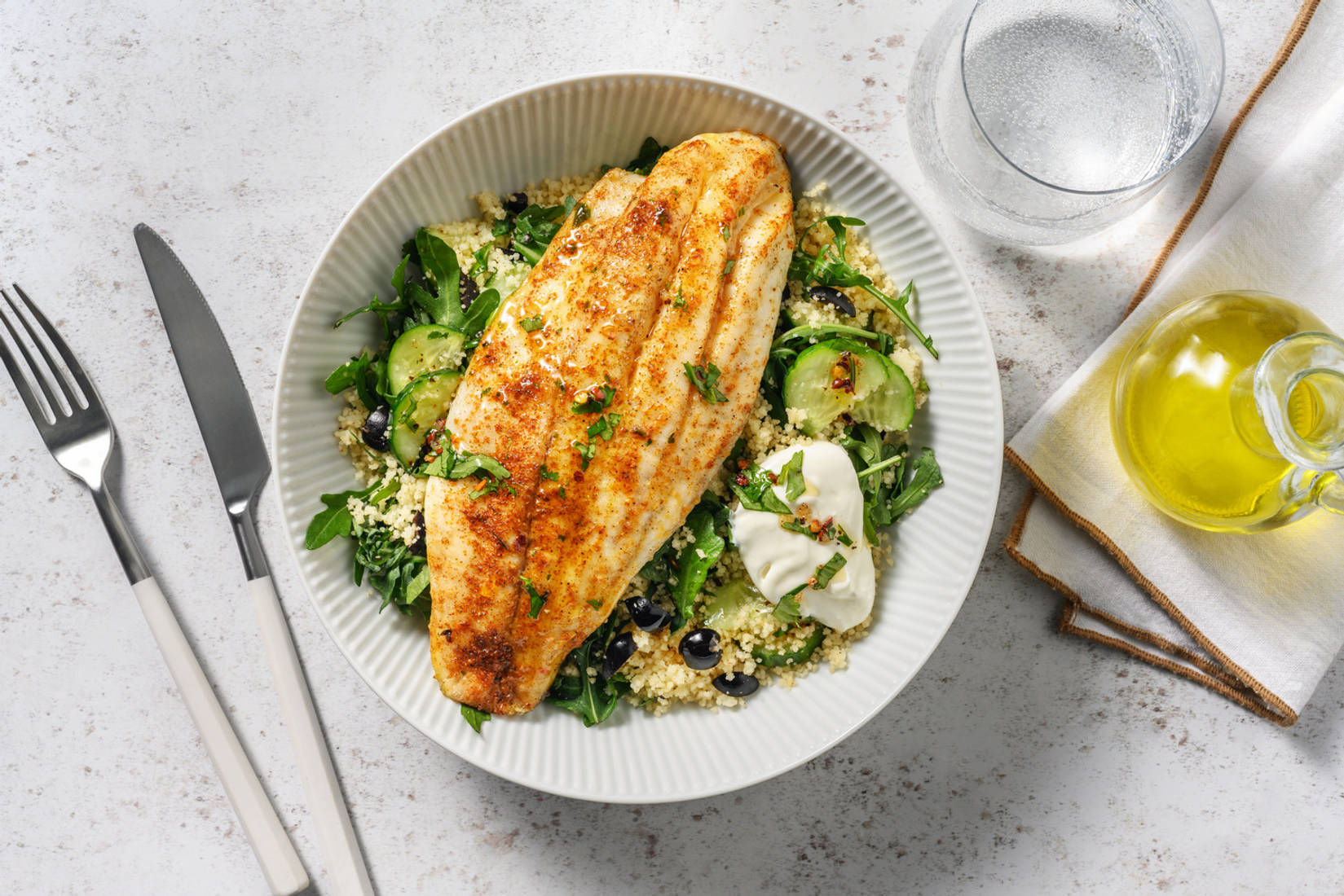 Baked Spiced Barramundi and Herby Olive Couscous