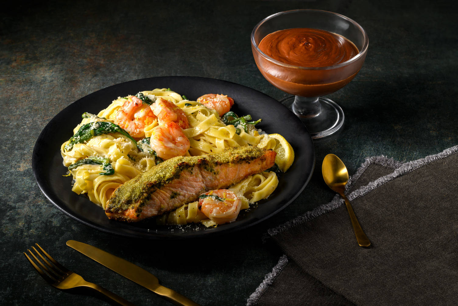 Pesto Salmon on Creamy King Prawn Tagliatelle