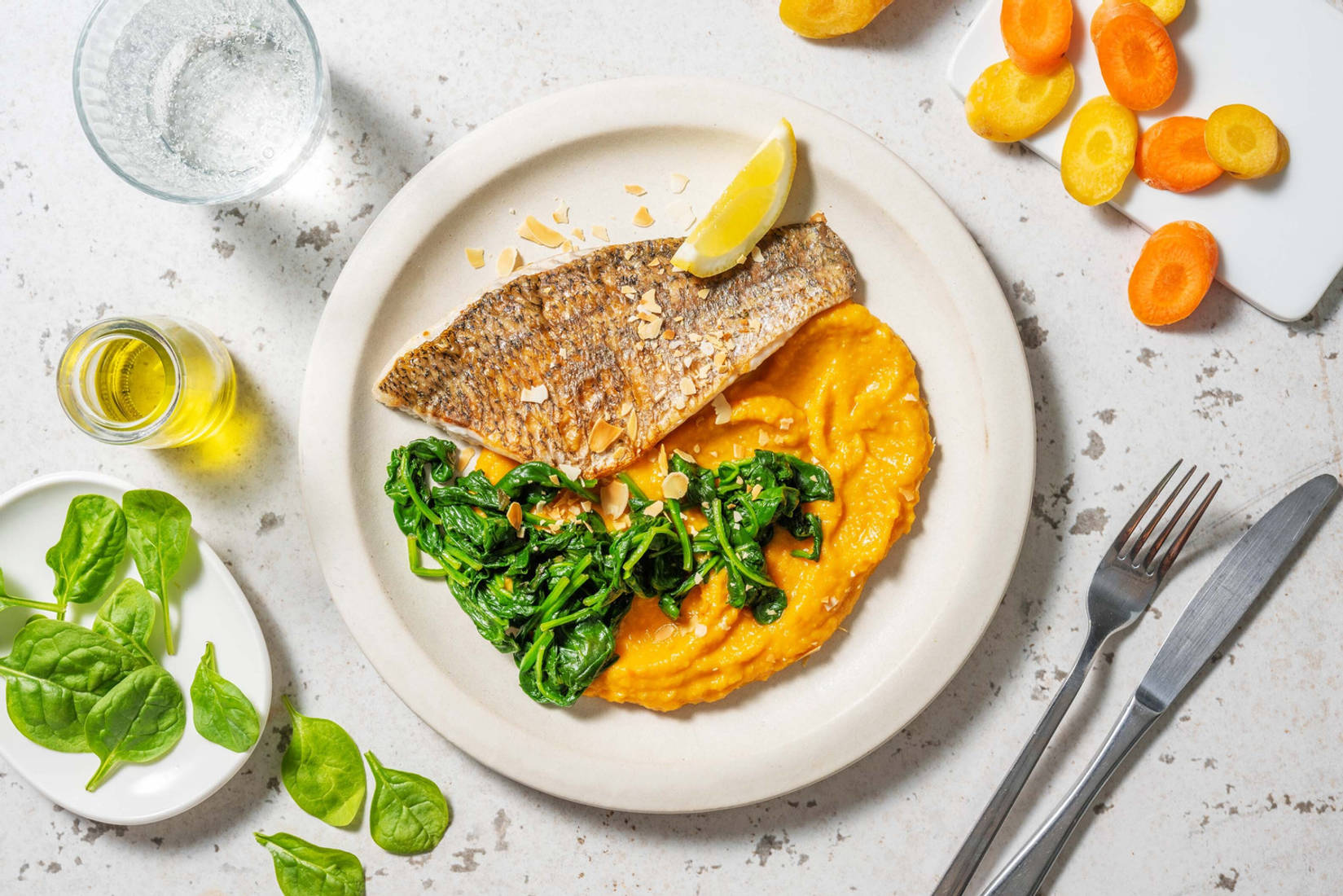 Heekfilet à la meunière met spinazie en amandel