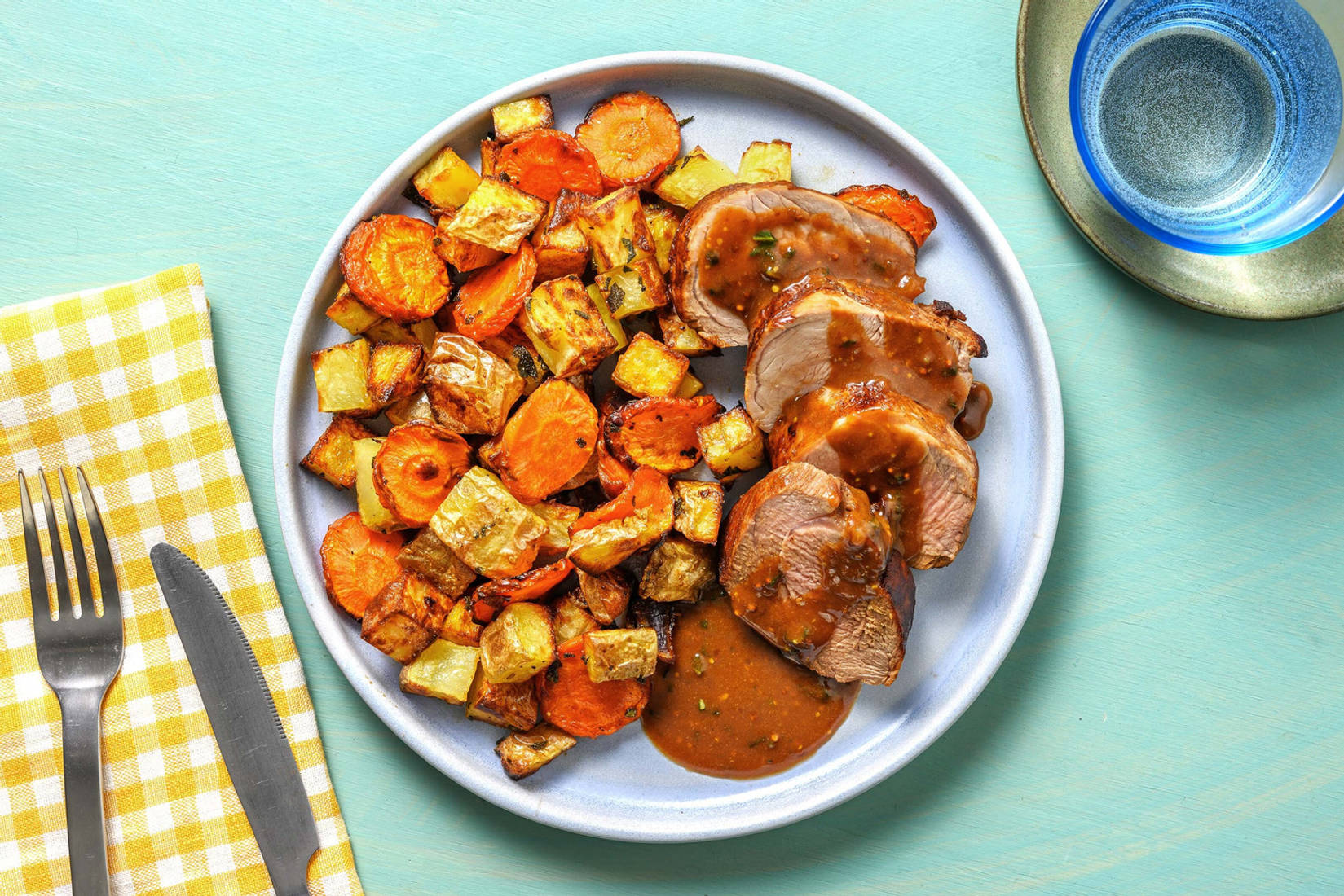 Filet de porc et légumes au four