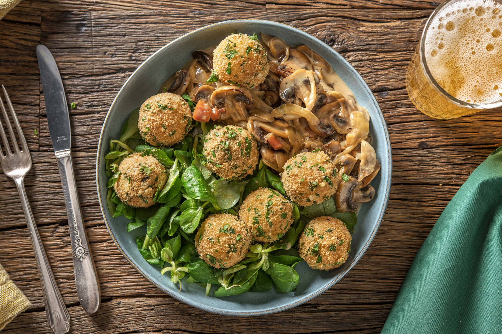 Kartoffelknödel mit Speck-Rahmschwammerln