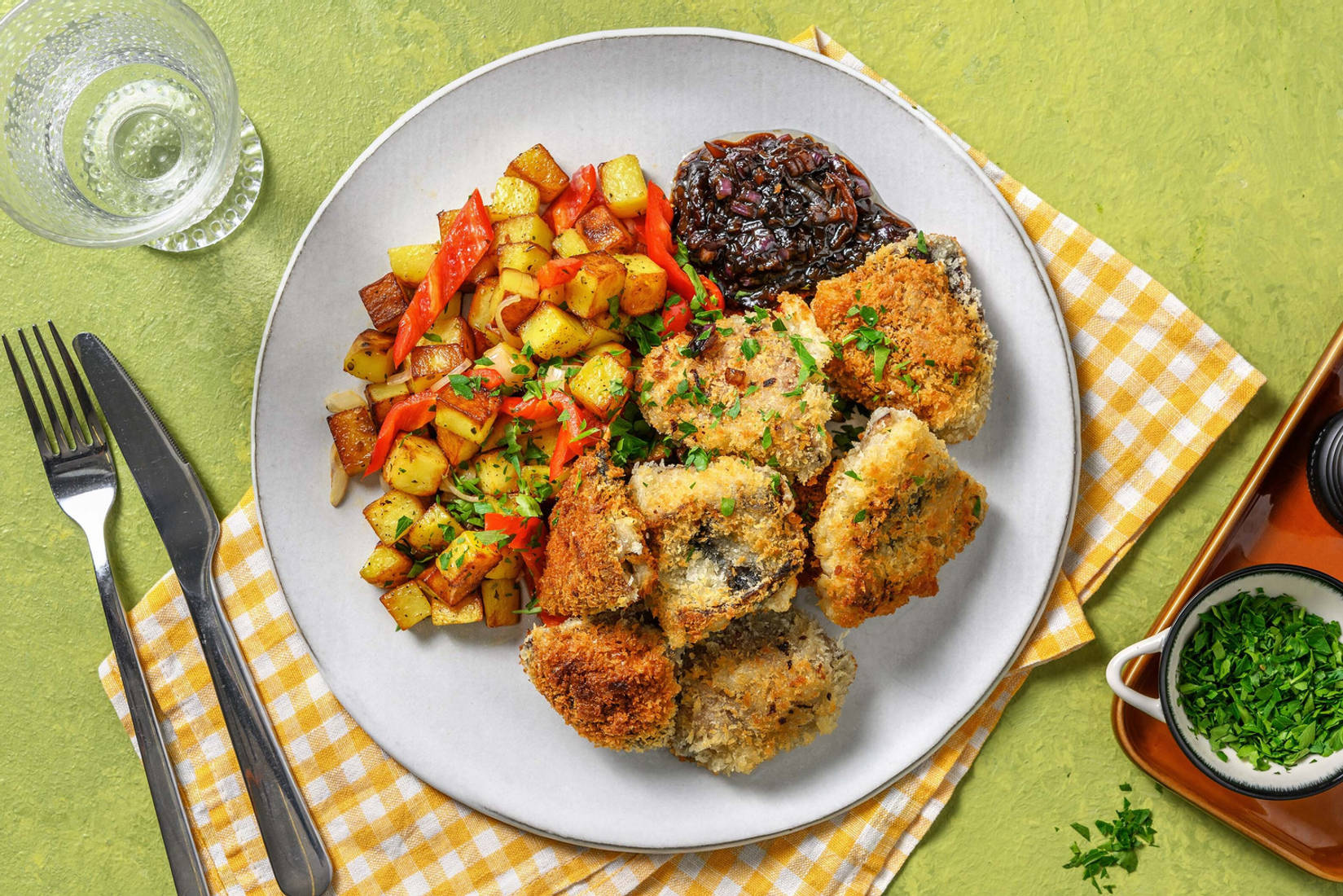 Gepaneerde portobello met gebakken aardappel