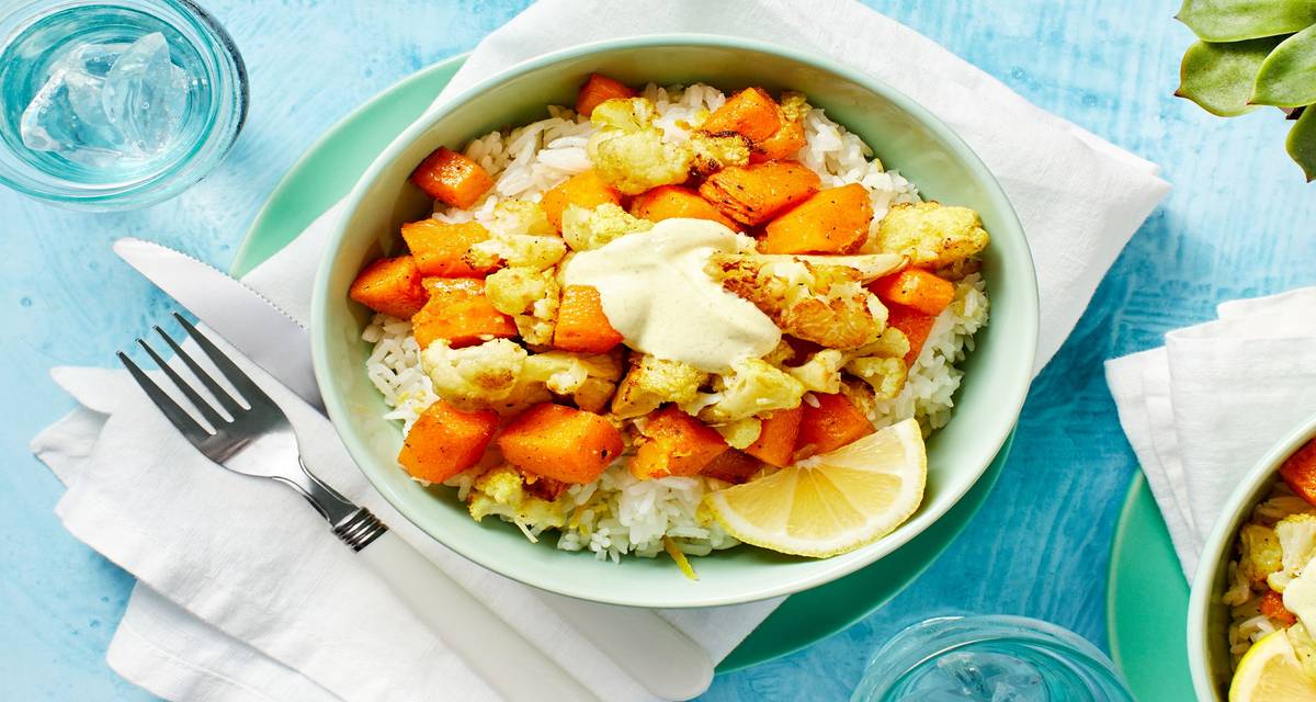 Curry-Spiced Cauliflower and Squash over Zesty Ginger Rice with Lemon Crema