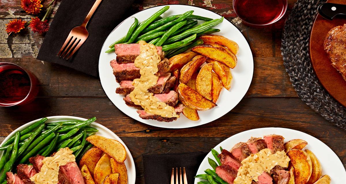 Truffle Rib-Eye Steaks with Seasoned Potato Wedges and Roasted Green Beans