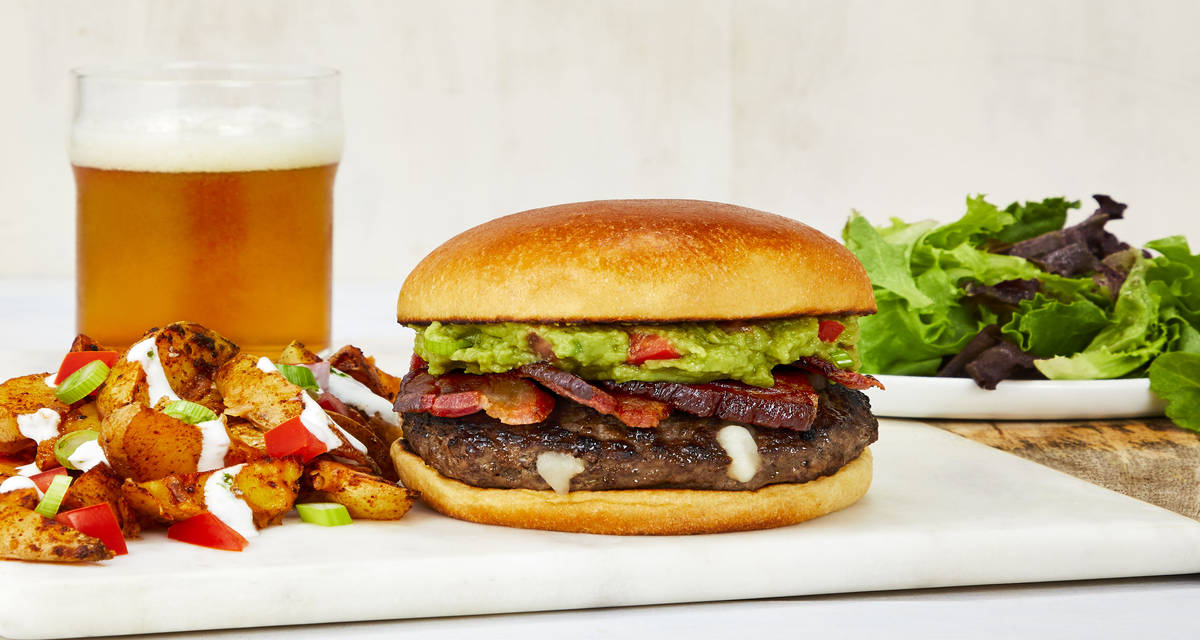 Bacon Guacamole D-Luxe Burgers with Nacho Mega Fries and Mixed Greens