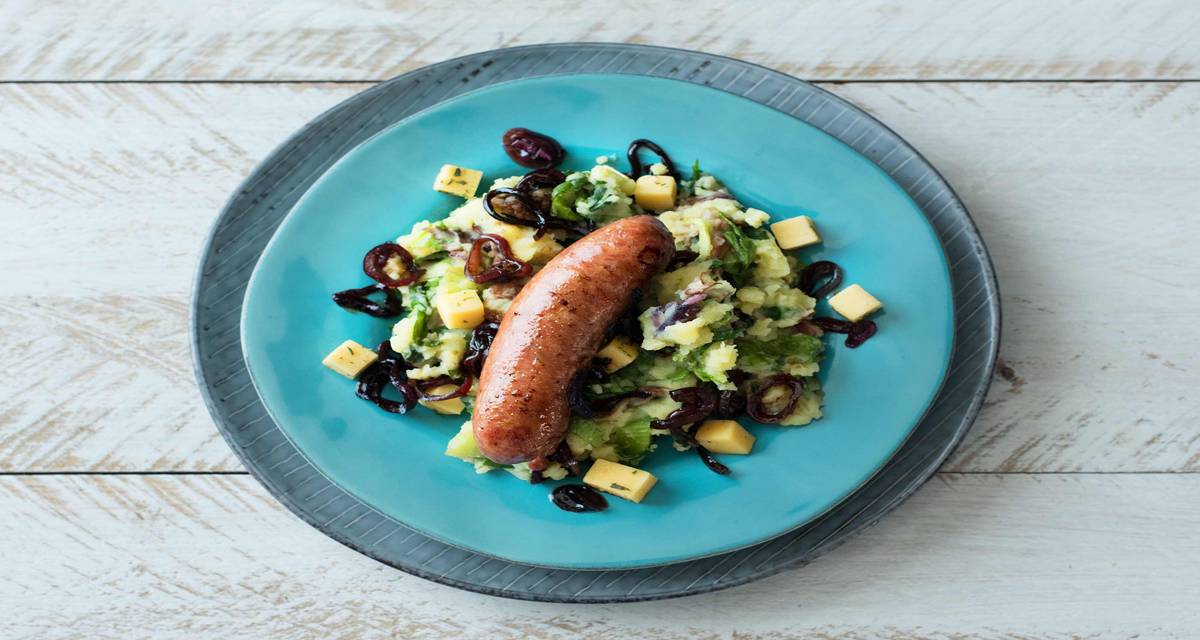 Purée de chicorée, saucisse Brandt & Levie, fromage aux herbes La saucisse au persil et à l’ail : un pur régal