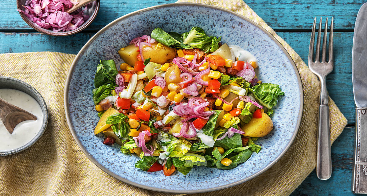Salade de grenailles au maïs et aux lardons Avec du poivron rouge et des échalotes aigres-douces