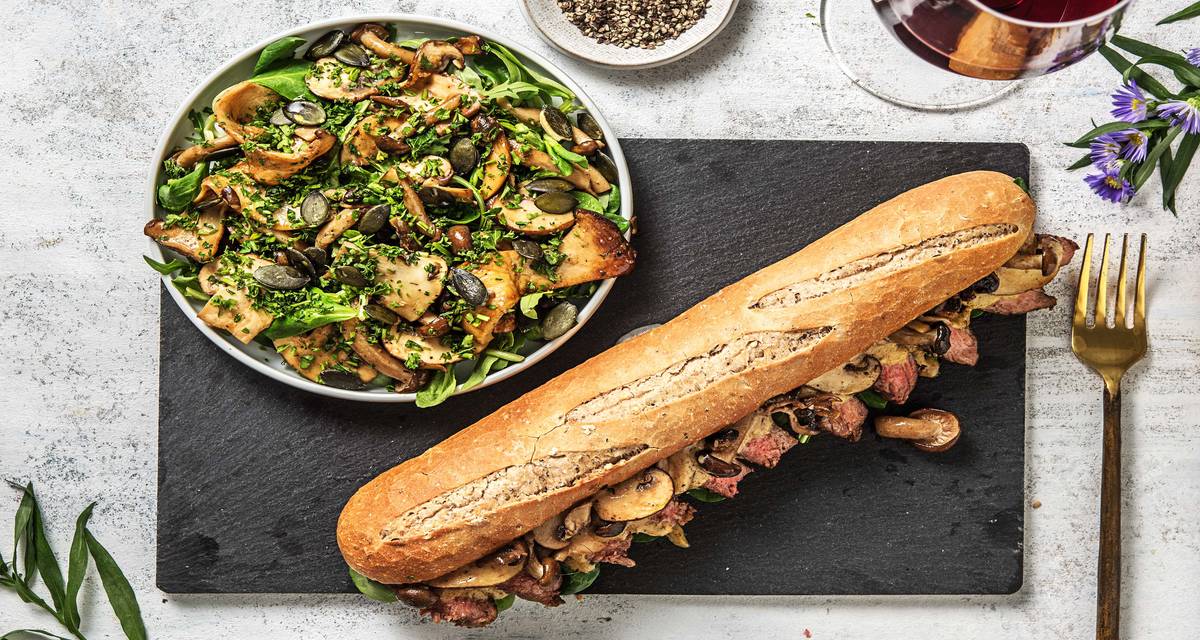 Rumsteak dans une baguette multicéréales Avec un mélange de champignons à l'ail et des graines de courge