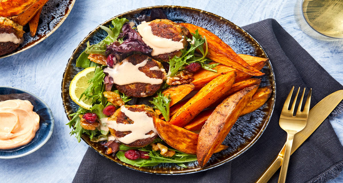 Aioli-Topped Crab Cakes with Roasted Sweet Potatoes and a Cranberry Walnut Salad