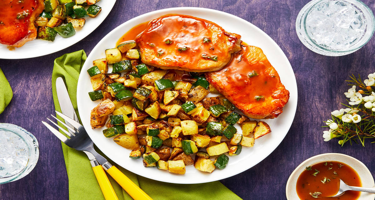Apricot Pork Cutlets with Crispy Zucchini and Potato Jumble
