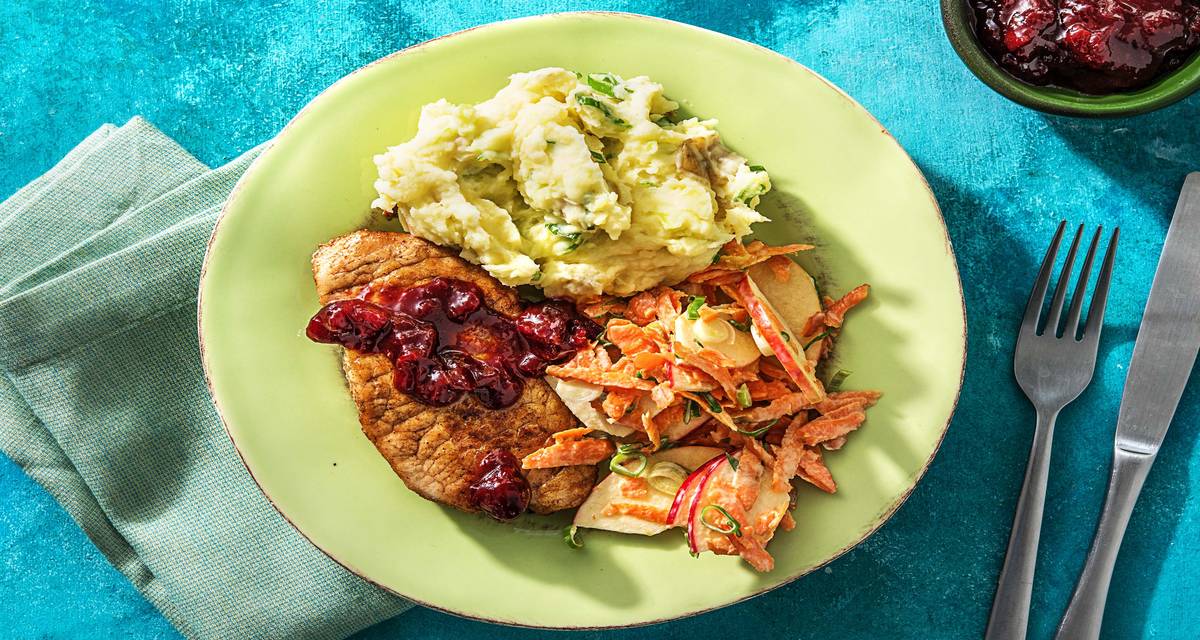 Sweet 'N' Smoky Pork Chops with Apple Carrot Slaw, Mashed Potatoes, and Cherry Sauce