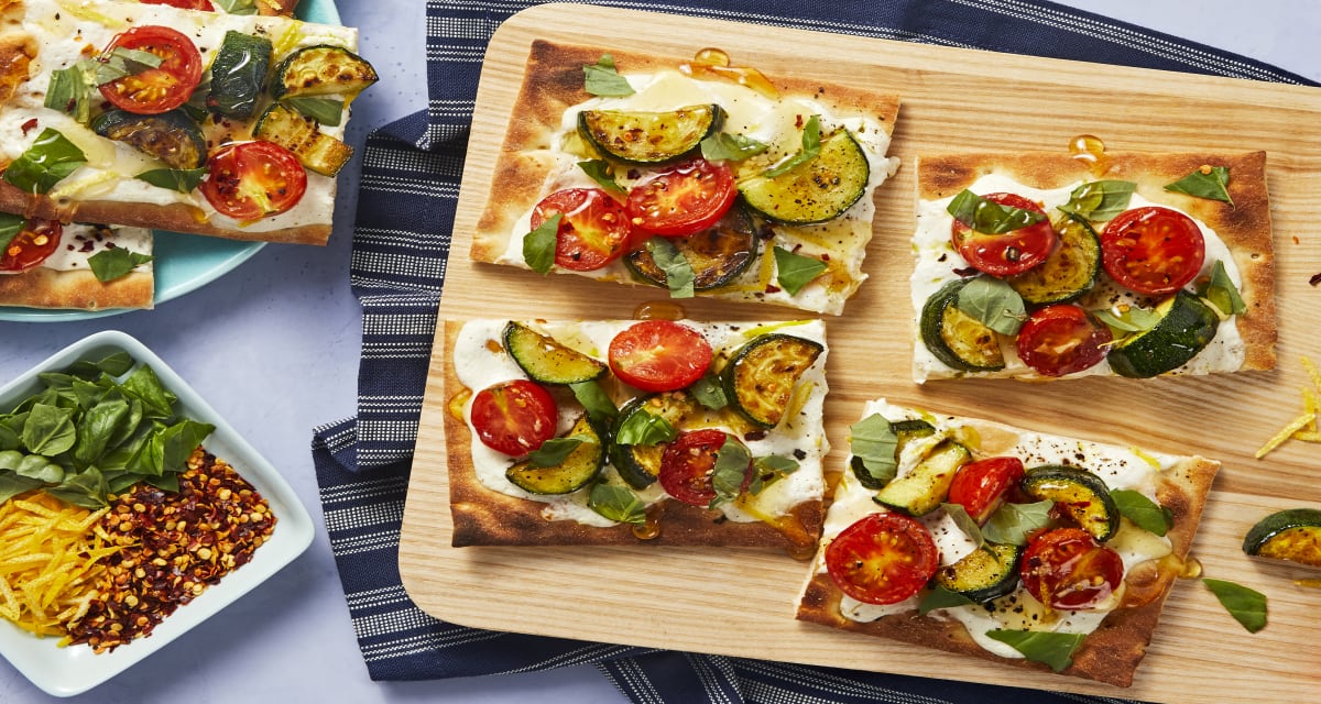 Zucchini and Tomato Flatbreads with Lemon Ricotta, Basil, Honey, and Chili Flakes-image