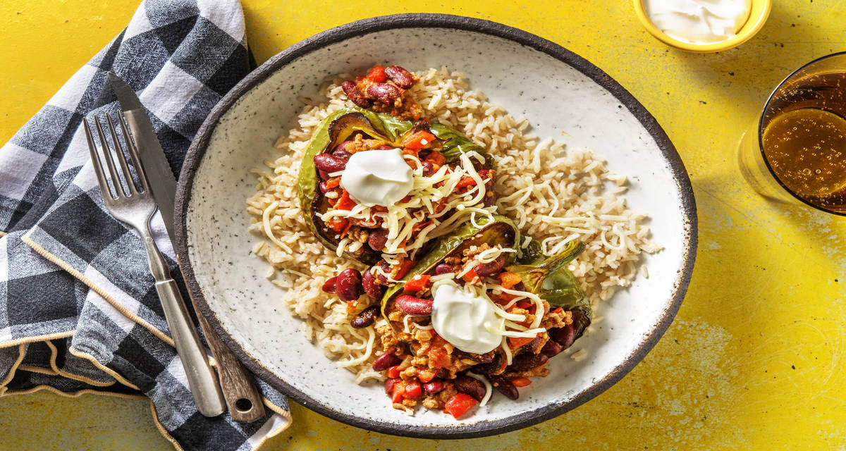 De poivrons farcis au chili con carne Accompagnés de riz complet et de yaourt