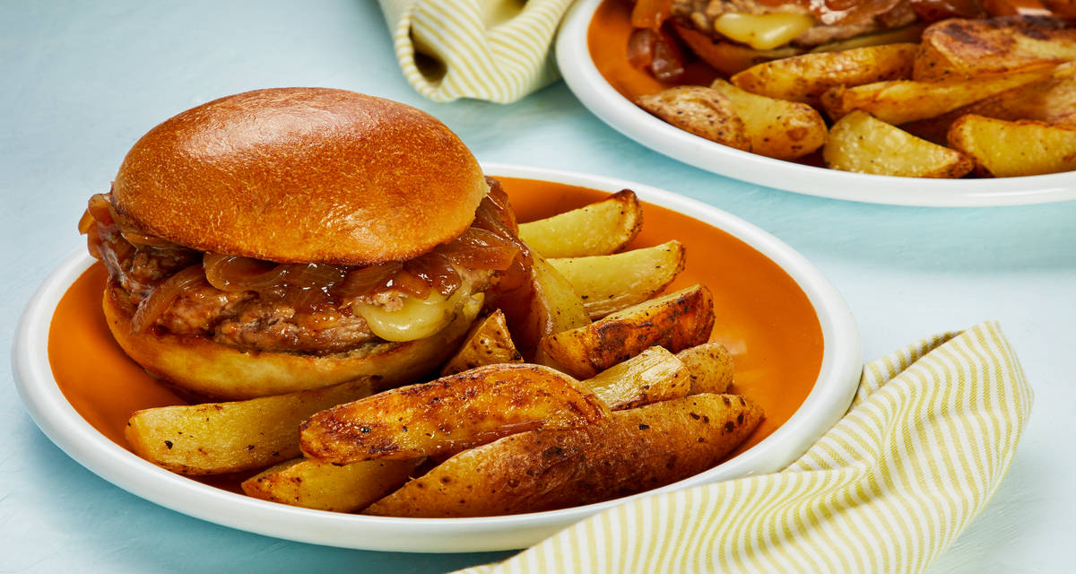 Gooey Stuffed Pork Burgers with BBQ Onions and Crispy Potato Wedges