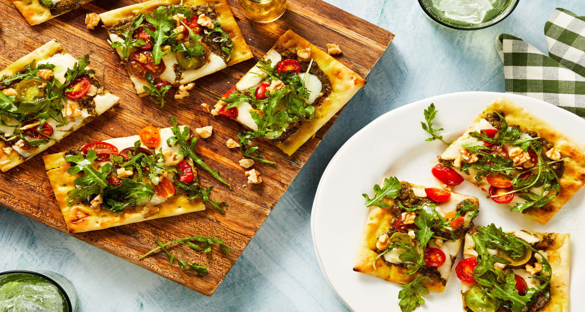 Heirloom Tomato Flatbreads with Pesto, Fresh Mozzarella, and Balsamic Greens-image
