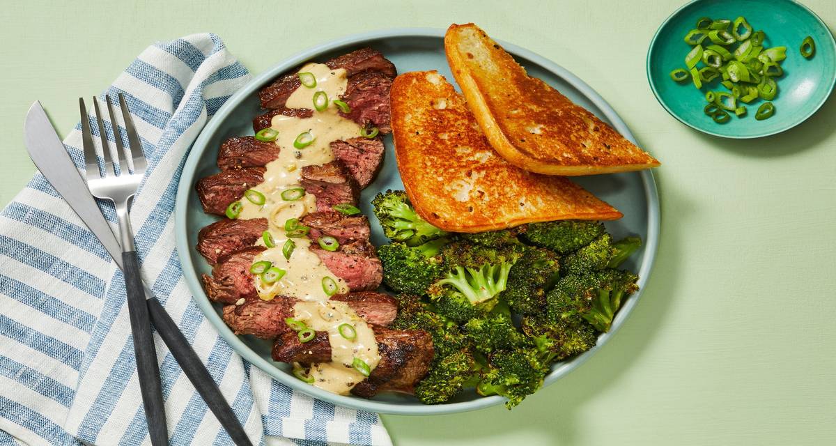 Peppercorn-Gravy Steak with Roasted Broccoli and Garlic Bread