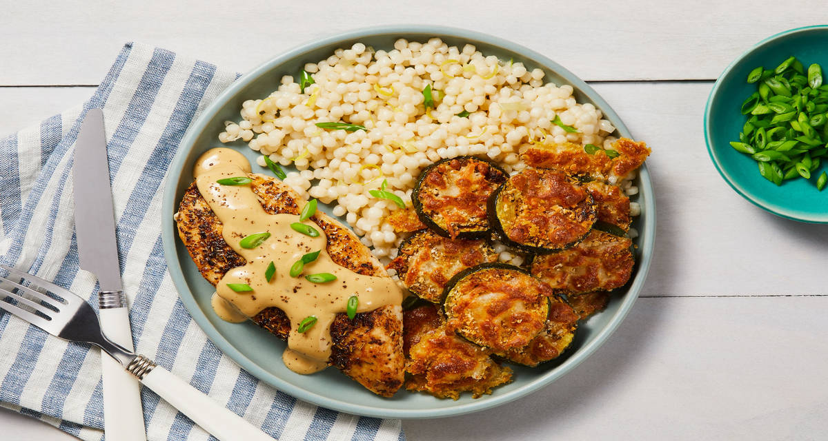 Creamy Lemon Butter Chicken with Mozzarella Zucchini Rounds & Scallion Couscous