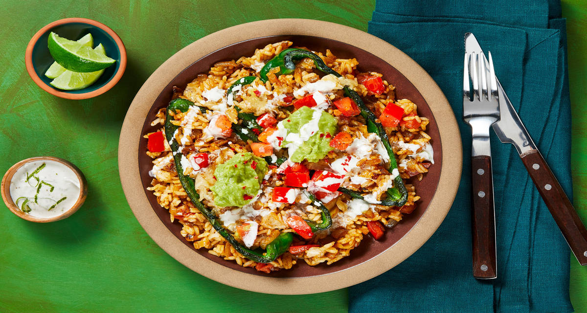 Mexican Cheesy Rice-Stuffed Poblanos with Guacamole & Zesty Crema